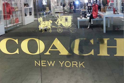 coach new york gold storefront logo